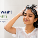Does washing hair daily cause hair fall in teens? Indian teenager washing hair with shampoo